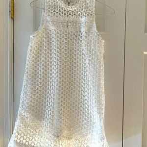 White lined eyelet dress size small.  Excellent condition.